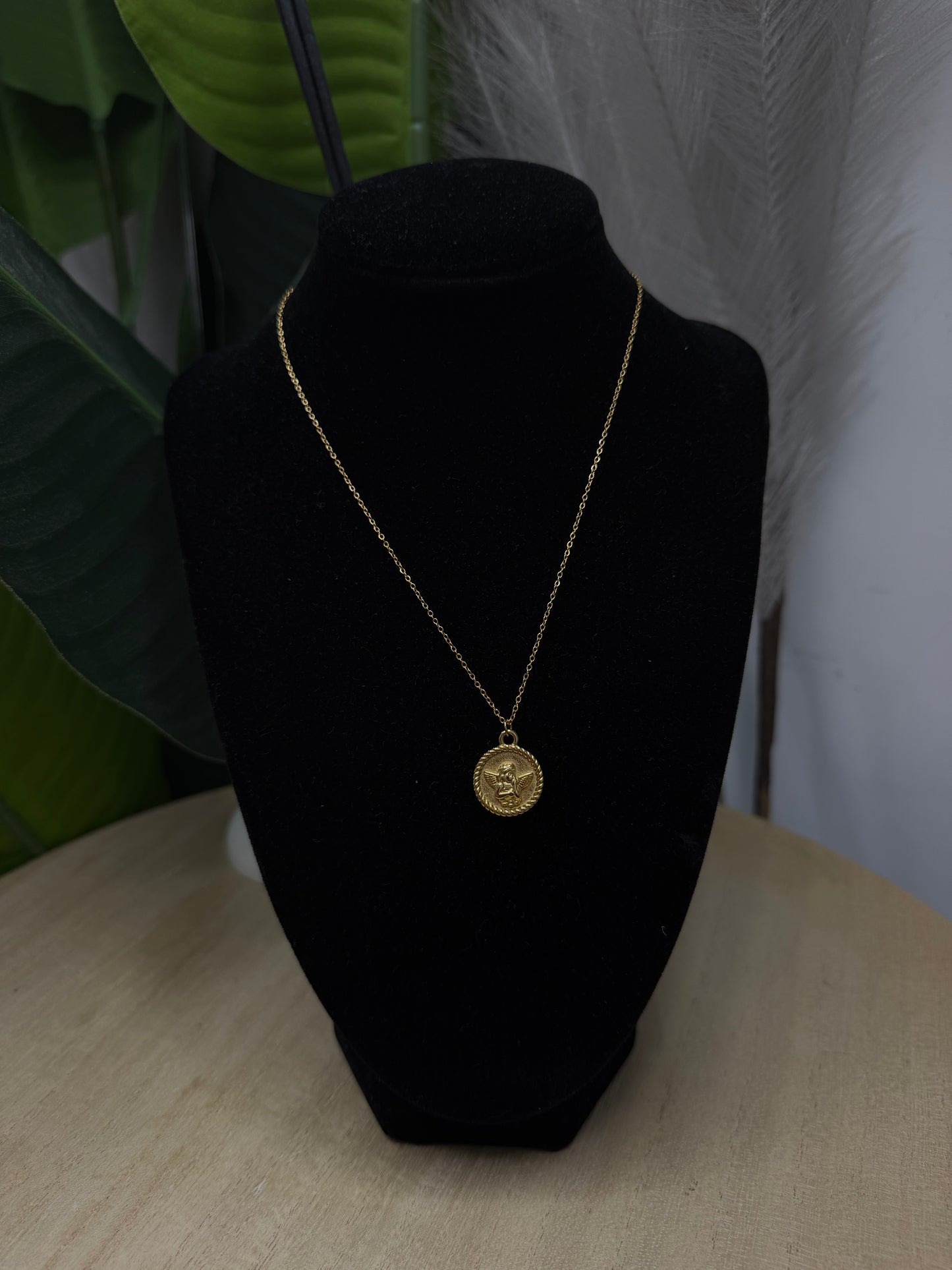 Collana gold placchetta putto